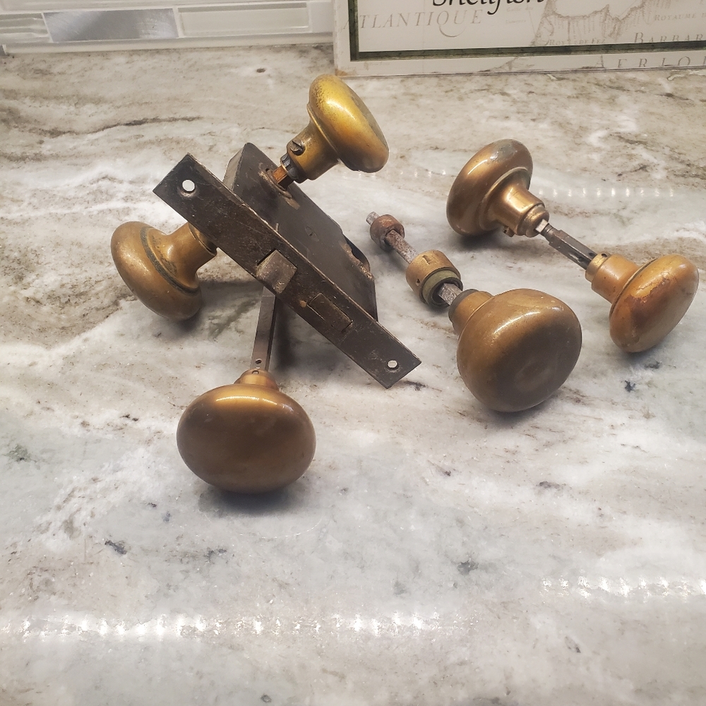 Set of vintage antique Gold Color Door Knobs and door mortise